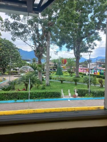 a view of a park from a train window at Casa de Albert in San Carlos