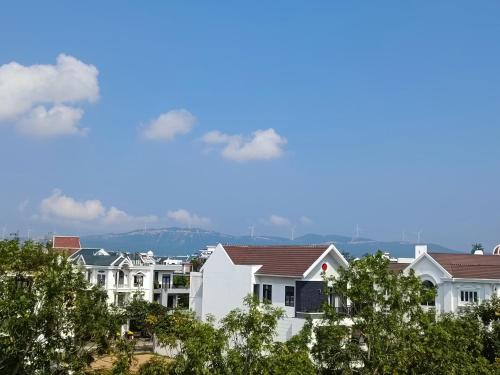 a view of a city with houses and trees at MyTran Homestay-HauLoan in Quy Nhon