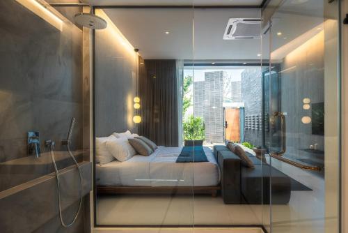 Un lugar para sentarse en Rhy.a Private Pool Villa