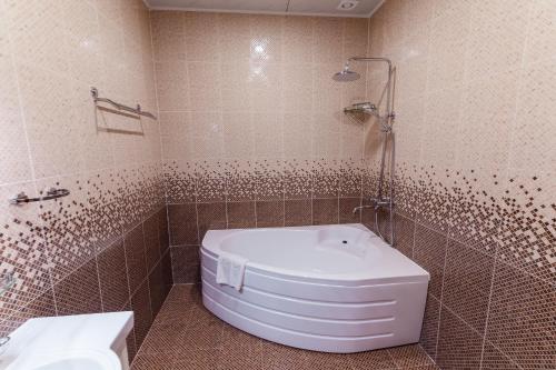 Koupelna v ubytování Simma Hotel Spa & Waterpark