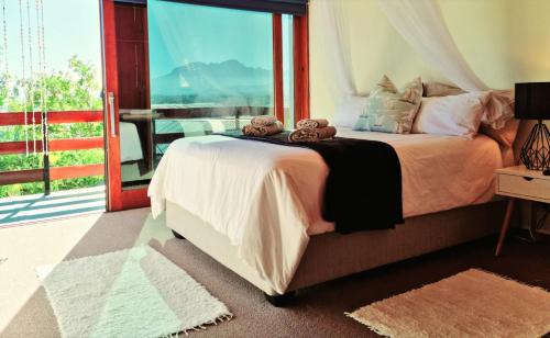 a bedroom with a bed with teddy bears on it at 'The Loft', 2 bedroom, sleeps 4, Central, Fantastic Views! in Cape Town