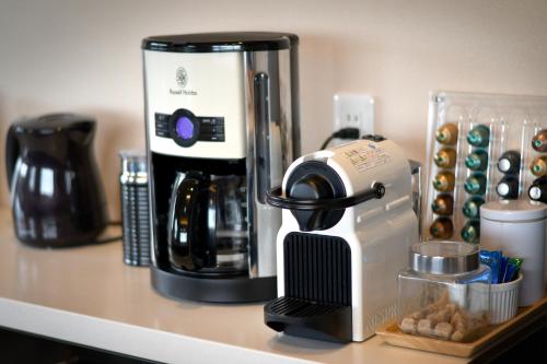 a coffee maker sitting on top of a counter at Ocean View Luxury Beach House - High-end stay beside Ohama Beach! in Shimoda
