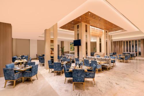 Zona de estar de Sandal Suites by Lemon Tree Hotels