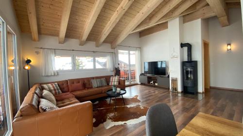 Posezení v ubytování Bergquelle Dachwohnung