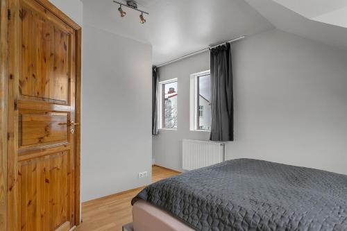 a bedroom with a bed and a window at U16 by Stay in Iceland in Reykjavík