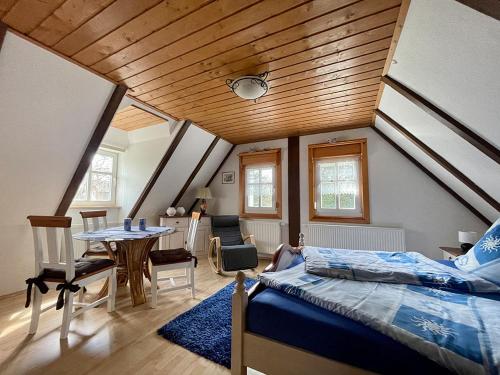 Postel nebo postele na pokoji v ubytování Ferienwohnung Zum Heuschober