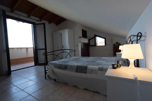 Кровать или кровати в номере Appartamento Delizia