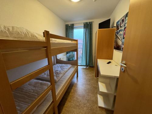 Postel nebo postele na pokoji v ubytování Ferienwohnung Roter Sand