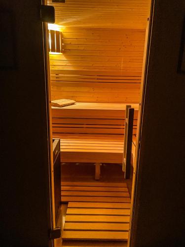 a staircase leading to a sauna in a room at Slunečný Penzion in Tasovice
