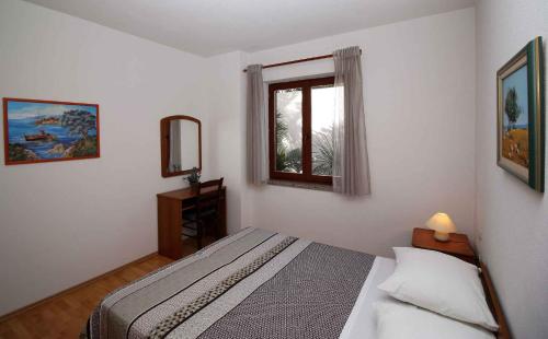 Posteľ alebo postele v izbe v ubytovaní Apartment in Rabac 16698