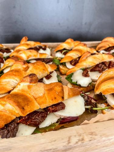 a bunch of sandwiches sitting on a tray at Slunečný Penzion in Tasovice
