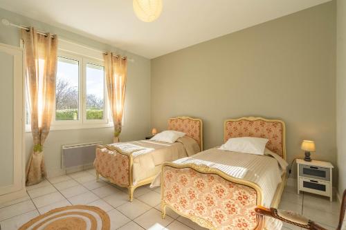 Ένα ή περισσότερα κρεβάτια σε δωμάτιο στο Villa Remojore