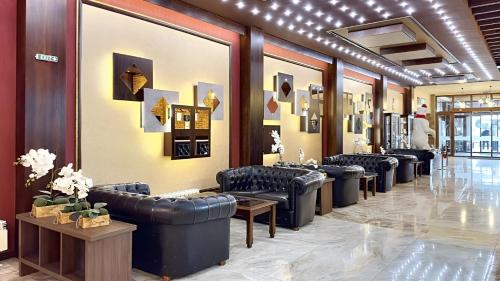 a row of couches in a waiting room at Platinum Hotel and Casino Bansko in Bansko