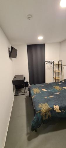 Ένα ή περισσότερα κρεβάτια σε δωμάτιο στο Hostal NANA B&B