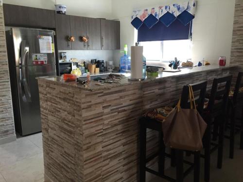 Kuhinja oz. manjša kuhinja v nastanitvi Napa Village Playa Blanca Resort