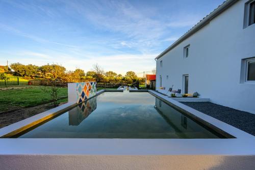 Бассейн в Casa das Pedras Country Retreat или поблизости