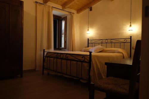 Postel nebo postele na pokoji v ubytování CASA RO