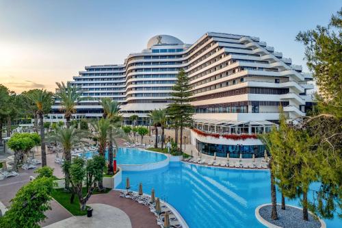 an image of a hotel with a large swimming pool at Rixos Downtown Antalya - The Land Of Legends Access in Antalya