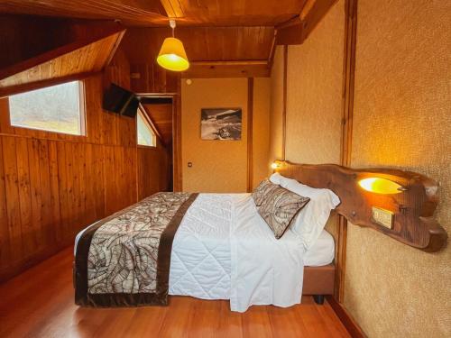 Een bed of bedden in een kamer bij Hotel Togo Monte Terminillo