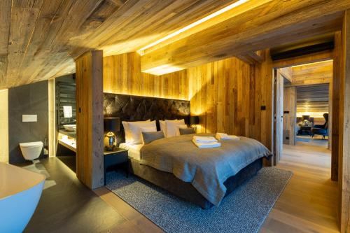 Posteľ alebo postele v izbe v ubytovaní Hotel Meta Resort & Vine SPA