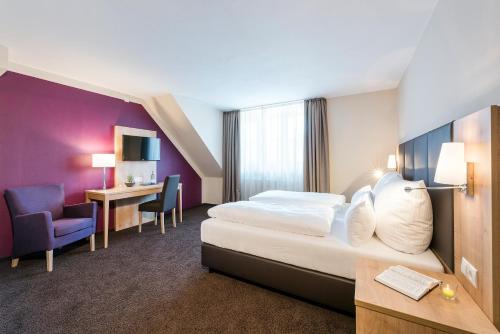 Postel nebo postele na pokoji v ubytování Die Post Hotel