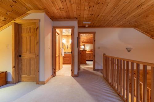Ένα ή περισσότερα κρεβάτια σε δωμάτιο στο Cozy Cabin
