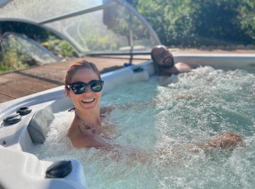 a woman in a jacuzzi in a boat at Casparidyll in Sigmaringen