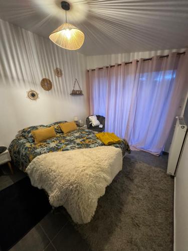 Giường trong phòng chung tại Gîte & Spa CASANOU