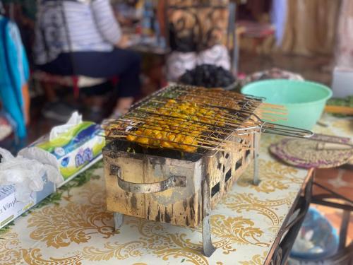 a bird cage sitting on top of a table at Riad Las Mil y una Noches Tetuan in Tetouan