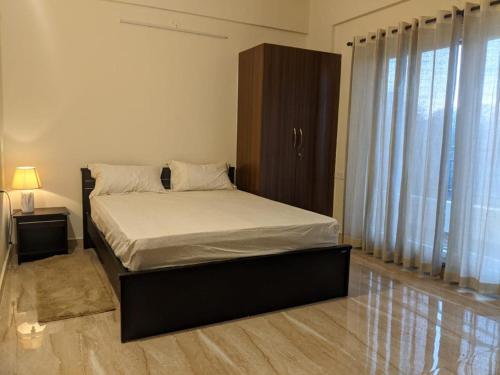 Posteľ alebo postele v izbe v ubytovaní Limelights Premium Serviced Residences