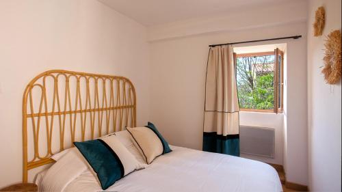 Ένα ή περισσότερα κρεβάτια σε δωμάτιο στο Casa Anto - Au coeur de Calenzana