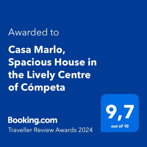 a screenshot of a phone with the text awarded to casa maria spontaneous house at Casa Marlo, Spacious House in the Lively Centre of Cómpeta in Cómpeta
