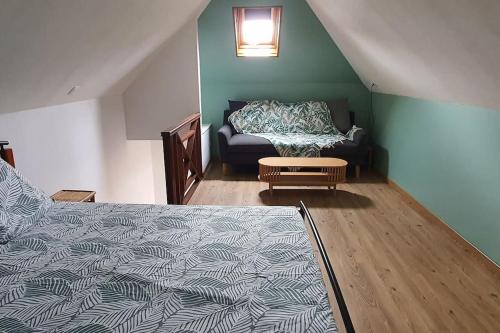 Postel nebo postele na pokoji v ubytování Les Clairs Matins