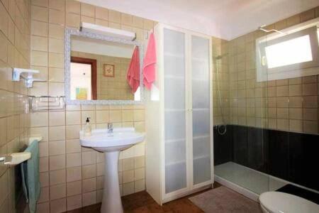Kúpeľňa v ubytovaní Sa Calma Beach House