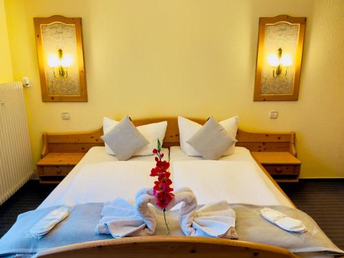 Ένα ή περισσότερα κρεβάτια σε δωμάτιο στο Hotel Restaurant Adler Stube
