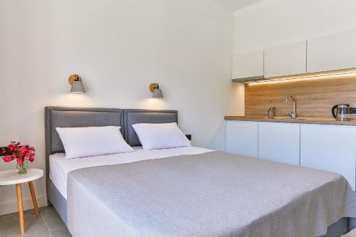 Cama o camas de una habitación en Apartments Magic box II