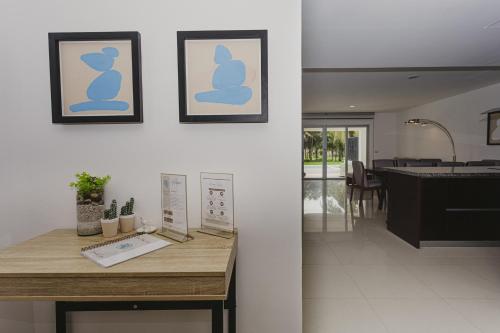a kitchen and dining room with a table in a house at Casa Mistica 703 N condo in Cedro