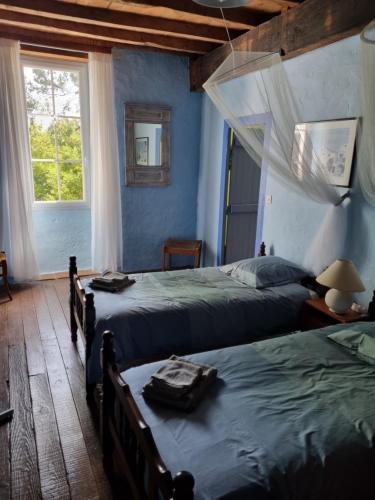 Ένα ή περισσότερα κρεβάτια σε δωμάτιο στο Mimosa