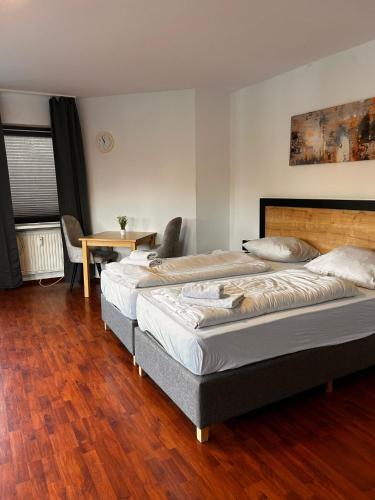 Una cama o camas en una habitación de Hotel Rennekamp