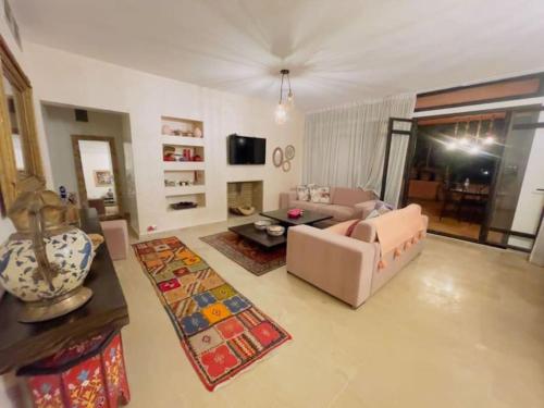Gallery image of Appartement cosy et calme avec jardin et piscine in Marrakech