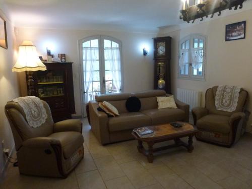 Χώρος καθιστικού στο Chambre d'hôtes La Pinede