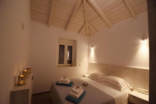 Кровать или кровати в номере Zarmine Villa