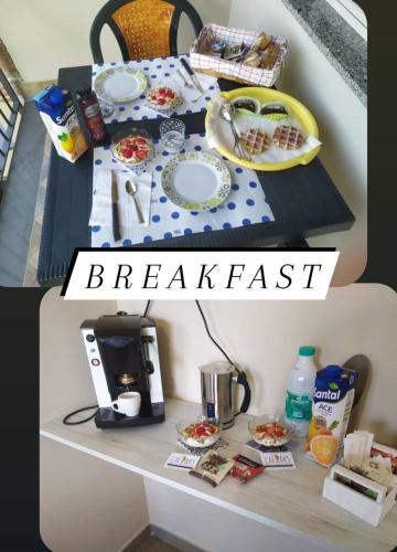 a table topped with a breakfast table with a coffee maker at Caesar's B&B in Scafati