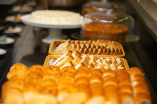 a display of breads and pastries in a bakery at ibis Styles Belém do Pará in Belém