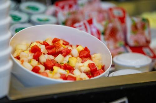 a white bowl of food on a counter at ibis Styles Belém do Pará in Belém