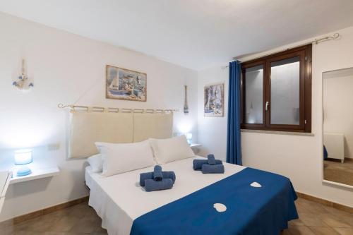 Ένα ή περισσότερα κρεβάτια σε δωμάτιο στο Villa del Moro, FREE WIFI, 300mt from Sinzias' Beach