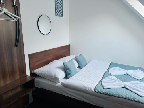 מיטה או מיטות בחדר ב-Vincent