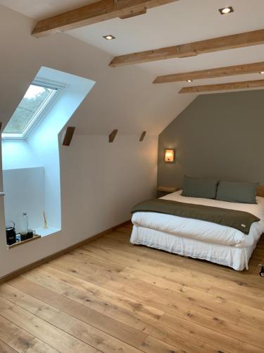Säng eller sängar i ett rum på La Grange De L’Abille