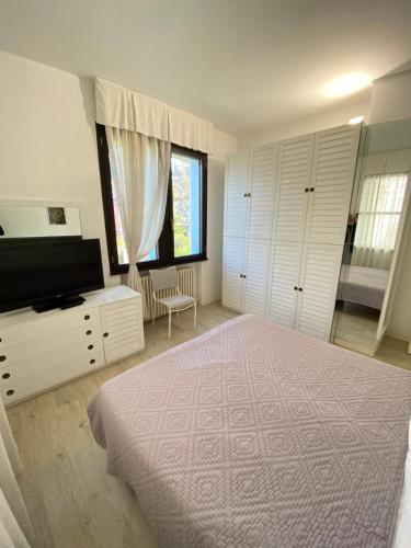 Ένα ή περισσότερα κρεβάτια σε δωμάτιο στο Villetta Trieste-Flexrent Immobiliare Abissinia