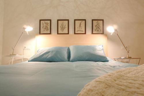 A bed or beds in a room at Moderno y Centrico Apartamento 1 dormitorio